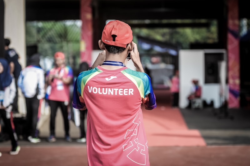 Volunteer supporting community programmes